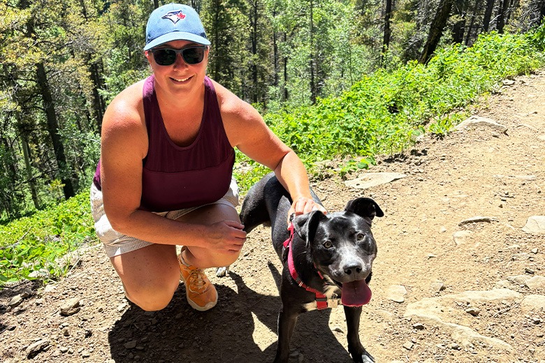 Julie Lylander walking a client dog in Calgary